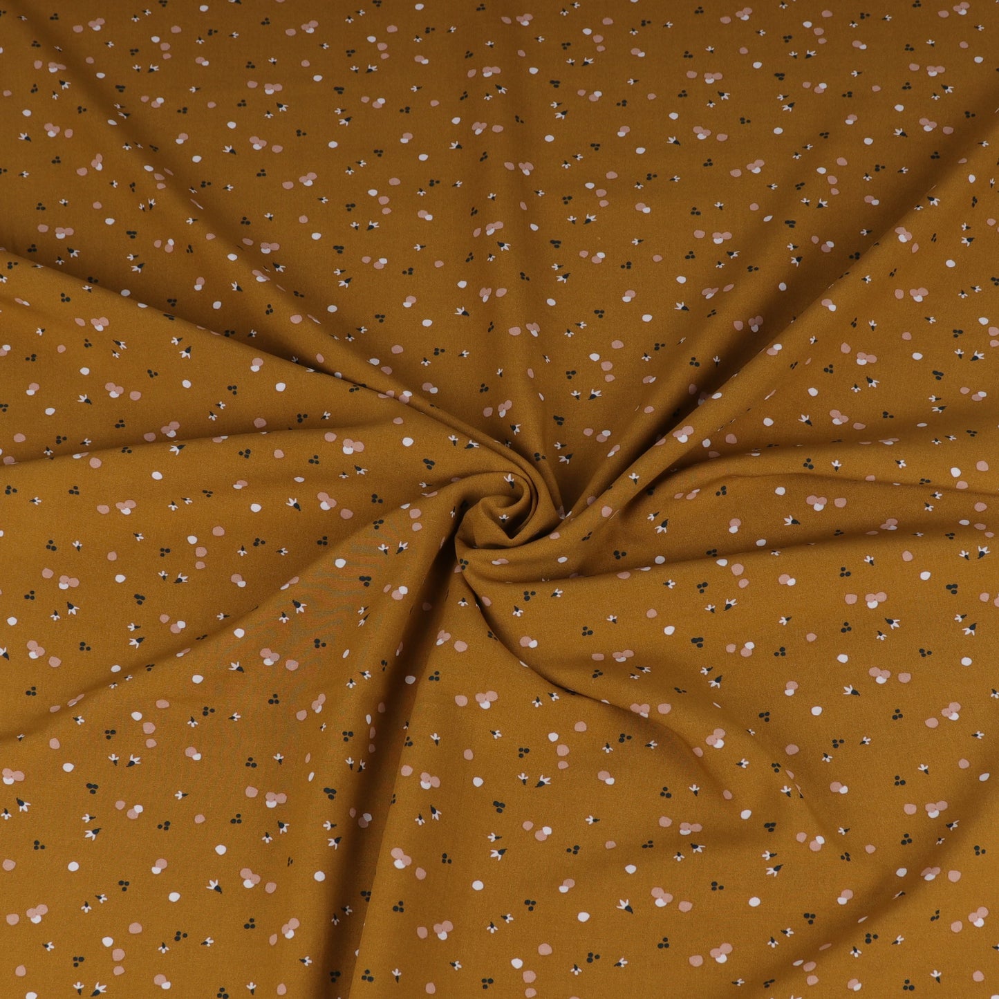 Ochre fluid viscose with abstract white and light pink pattern