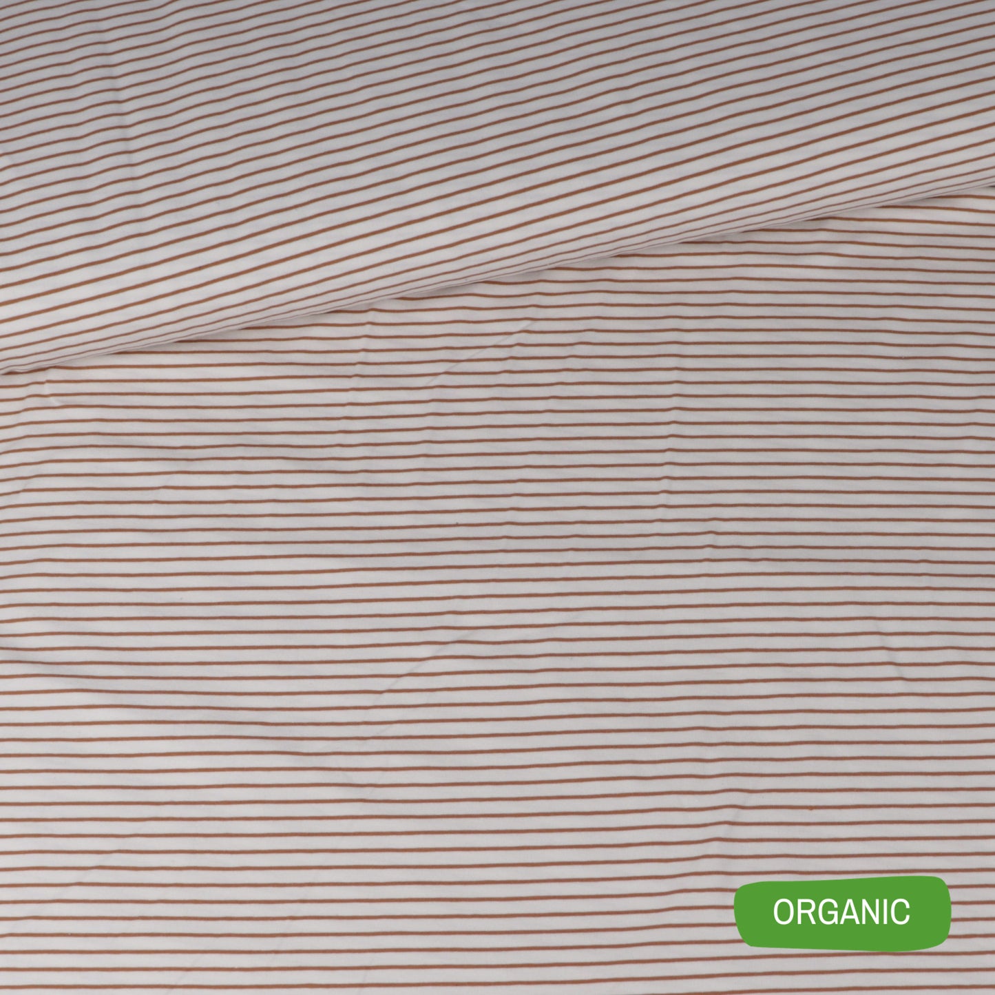 Organic off-white and almond stretch jersey