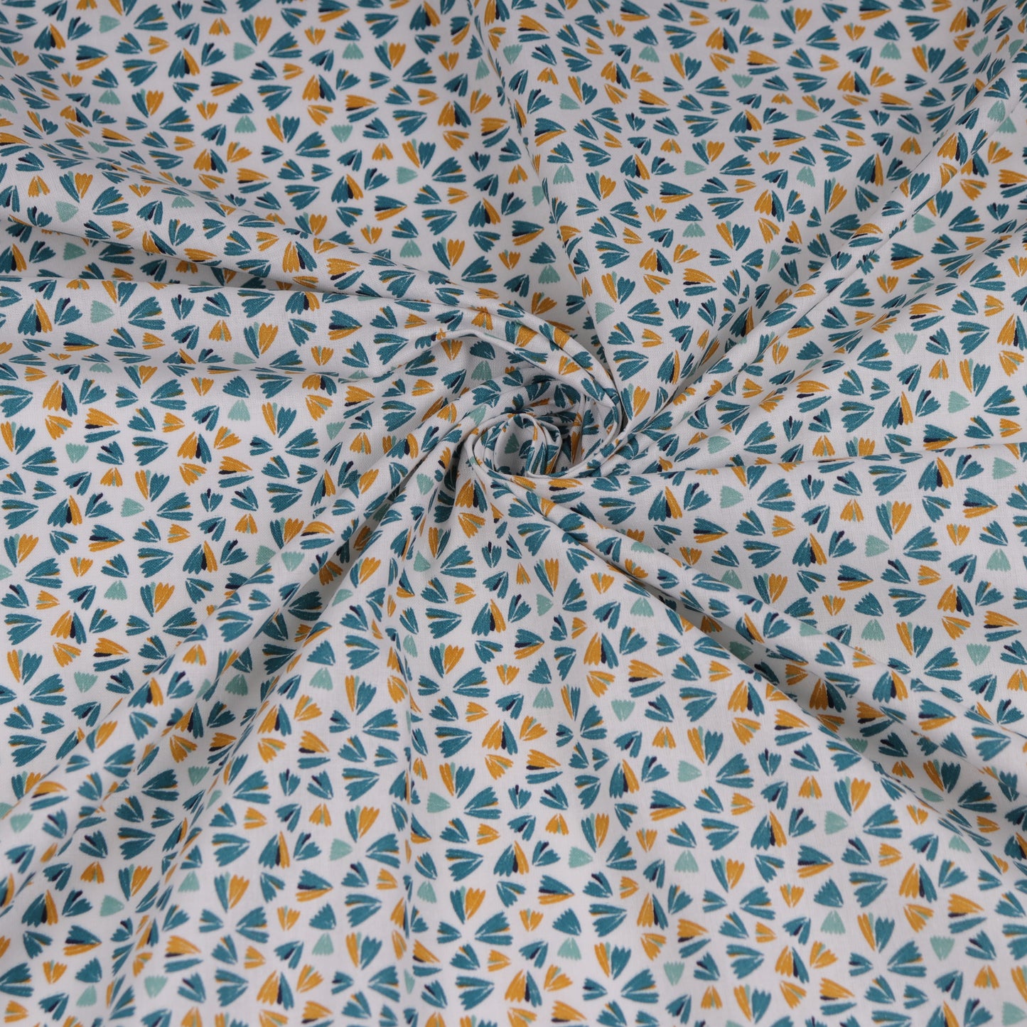 Printed white cotton fabric with geometrical blue and yellow pattern