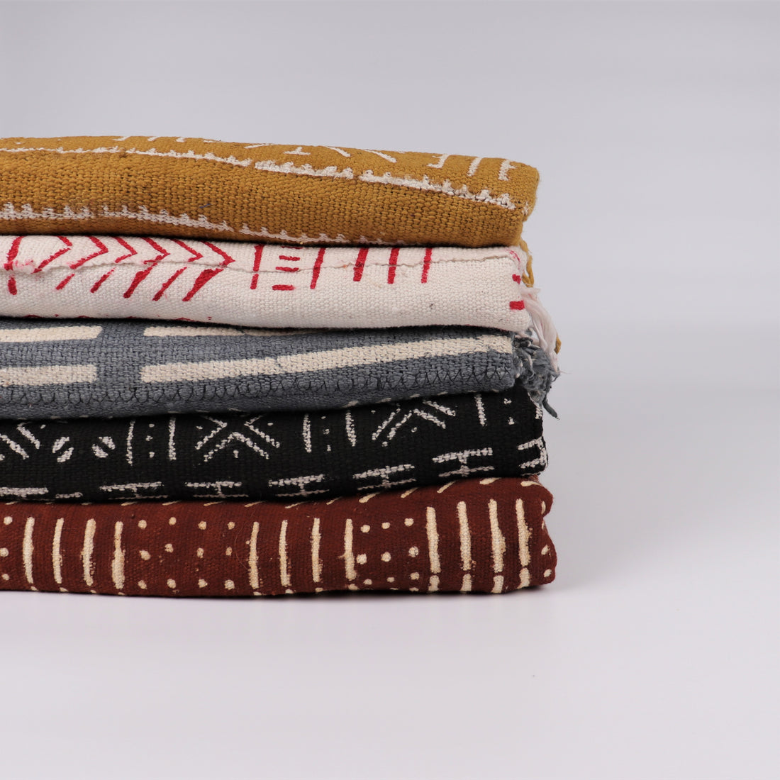 Pile of colorful bogolan textile