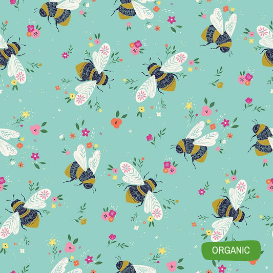 Blue organic cotton poplin with black and yellow bees and colourful flowers